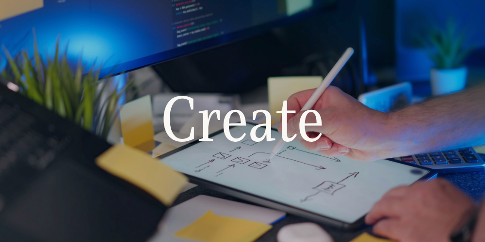 "Create" — sketching a content strategy on a tablet, Design Map Studio Dubai